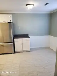 3309 Bridges Street C 14, Morehead City, NC 28557 — 2-bedroom condo in The Bridges Condominium, Morehead City, NC, photo 7 of 20: Open to dining area