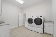 16 Middlebury Road, Pinehurst, NC 28374 — 4-bedroom home in Forest Creek, Pinehurst, NC, photo 17 of 35: Laundry off primary