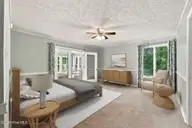 6207 Gondolier Drive, New Bern, NC 28560 — 3-bedroom waterfront home in Fairfield Harbour, New Bern, NC, photo 17 of 49: Primary suite-virtually staged