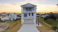 113 Ocean View Avenue, Kure Beach, NC 28449 — 4-bedroom waterfront home in Hanby Beach, Kure Beach, NC, photo 1 of 80