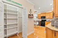 1031 Mallard Bay Road, Hampstead, NC 28443 — 4-bedroom waterfront home in Mallard Bay, Hampstead, NC, photo 23 of 72: 33_pantry & kitchen