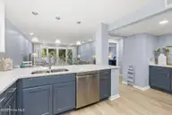331 Salter Path Road 104 Beachwalk, Pine Knoll Shores, NC 28512 — 3-bedroom waterfront condo in Beachwalk, Pine Knoll Shores, NC, photo 12 of 47: Updated kitchen w/ bar seating