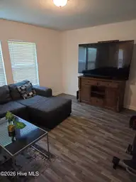 3302 Taylors Pointe Drive, Winterville, NC 28590 — 4-bedroom home in Taylor's Pointe, Winterville, NC, photo 2 of 29: Open living room