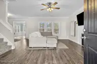 7177 Old Stump Drive SE, Leland, NC 28451 — 4-bedroom home in Cypress Bay, Leland, NC, photo 6 of 70: Living Room