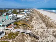 511 N Anderson Boulevard, Topsail Beach, NC 28445 — 4-bedroom waterfront home in Sidbury Beach, Topsail Beach, NC, photo 3 of 72: 065_dji_20260304130830_0133_dp_850