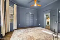 223 S 5th Avenue, Wilmington, NC 28401 — 6-bedroom home in Historic District, Wilmington, NC, photo 22 of 48: Unit A Front Bedroom