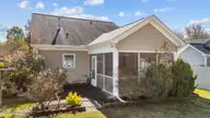 3302 Feldspar Court SW, Wilson, NC 27893 — 2-bedroom home in Cranberry Ridge, Wilson, NC, photo 16 of 18: Screened porch