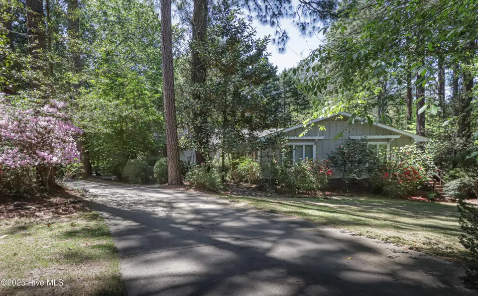 1 Collett Lane, Pinehurst, NC 28374 — 4-bedroom home in Unit 2, Pinehurst, NC, photo 1 of 49: 1 Collett Dr - FRONT