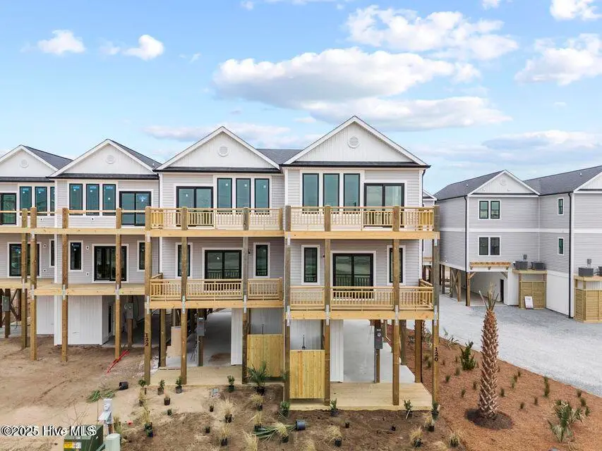 753 N Topsail Drive, Surf City, NC 28445 — 3-bedroom waterfront townhome in Dune Ridge, Surf City, NC, photo 1 of 22: 765 Dune Ridge photo place holder on MLS