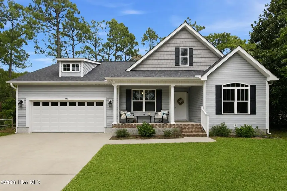 496 Tate Lake Drive, Southport, NC 28461 — 3-bedroom waterfront home in Boiling Spring Lakes, Southport, NC, photo 1 of 49