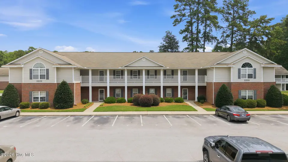 2225 Locksley Woods Drive F, Greenville, NC 27858 — 2-bedroom condo in Locksley Woods, Greenville, NC, photo 1 of 52: 1-web-or-mls-DJI_20260625115453_0424_D