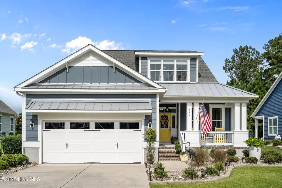 222 Twining Rose Lane, Holly Ridge, NC 28445 — 4-bedroom waterfront home in Summerhouse On Everett Bay, Holly Ridge, NC, photo 1 of 62: Front Elevation
