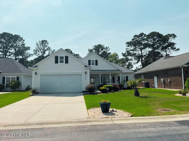 679 Meadowbrook Lane NW, Calabash, NC 28467 — 3-bedroom home in Meadowlands, Calabash, NC, photo 1 of 1: Front