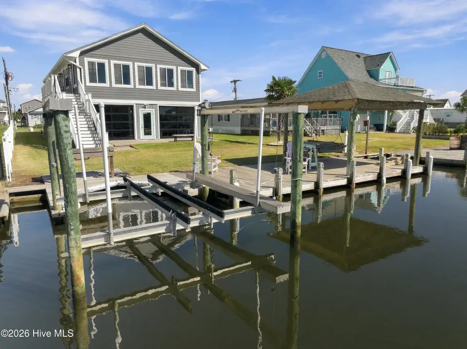 6075 6th Street, Surf City, NC 28445 — 3-bedroom waterfront home in Old Settlers Beach, Surf City, NC, photo 1 of 62: 6075 6th Street