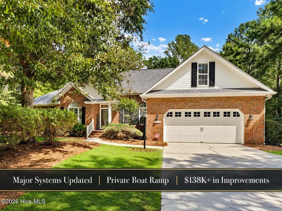 645 Sawgrass Road, Hampstead, NC 28443 — 3-bedroom waterfront home in Olde Point, Hampstead, NC, photo 1 of 38